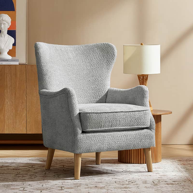 Fauteuil à oreilles avec accoudoirs encastrés, coussin amovible, garnissage en mousse et pieds en hévéa | Blanc / Ivoire / Gris / Chameau | Siège unique