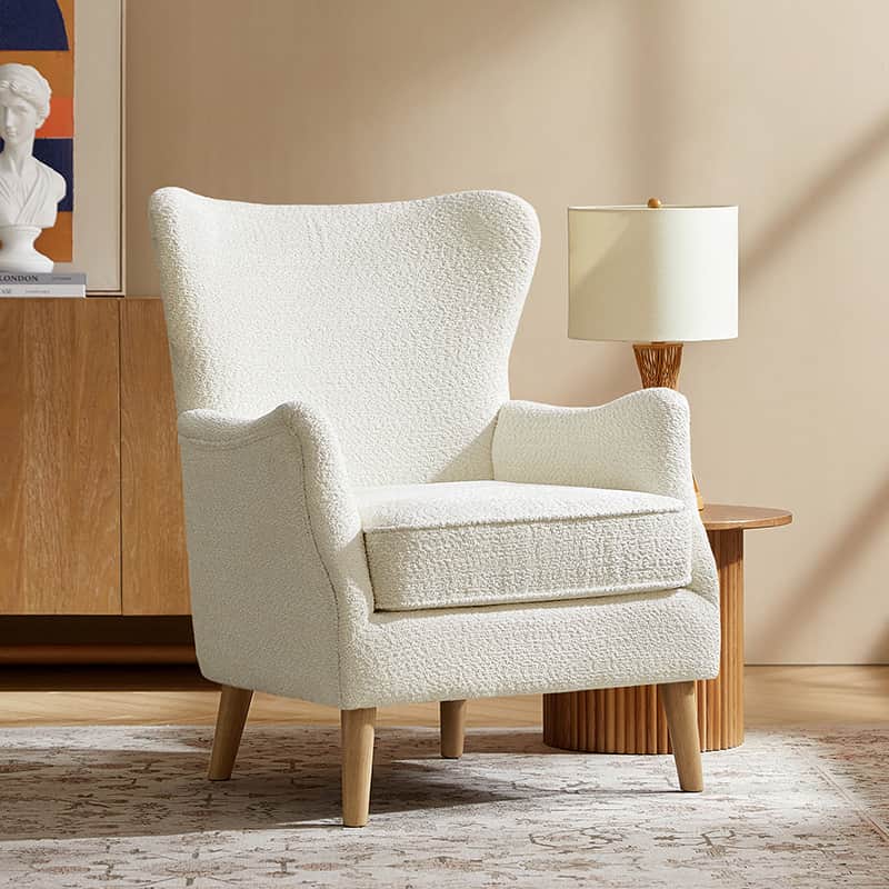 Fauteuil à oreilles avec accoudoirs encastrés, coussin amovible, garnissage en mousse et pieds en hévéa | Blanc / Ivoire / Gris / Chameau | Siège unique