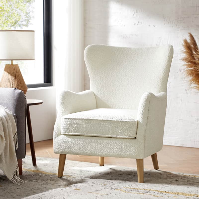 Fauteuil à oreilles avec accoudoirs encastrés, coussin amovible, garnissage en mousse et pieds en hévéa | Blanc / Ivoire / Gris / Chameau | Siège unique