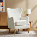 Fauteuil à oreilles avec accoudoirs encastrés, coussin amovible, garnissage en mousse et pieds en hévéa | Blanc / Ivoire / Gris / Chameau | Siège unique
