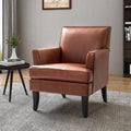 Fauteuil en cuir synthétique avec dossier clouté, rembourrage en mousse et pieds en bois massif noir | Marron / Bleu marine / Sauge / Gris | Siège unique