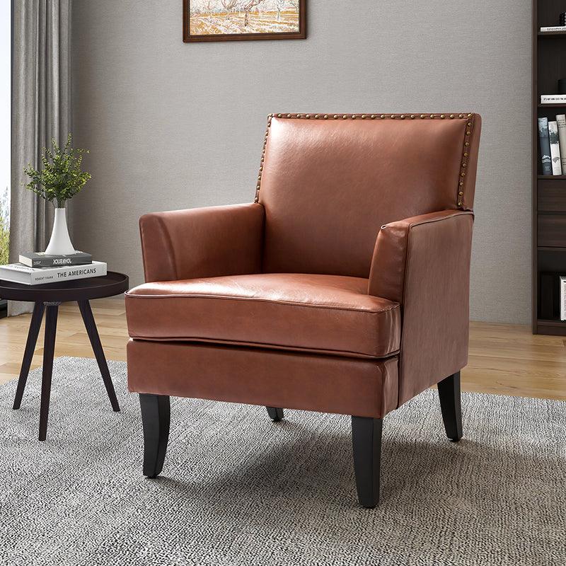 Fauteuil en cuir synthétique avec dossier clouté, rembourrage en mousse et pieds en bois massif noir | Marron / Bleu marine / Sauge / Gris | Siège unique