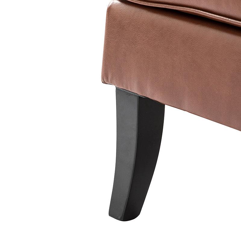 Fauteuil en cuir synthétique avec dossier clouté, rembourrage en mousse et pieds en bois massif noir | Marron / Bleu marine / Sauge / Gris | Siège unique