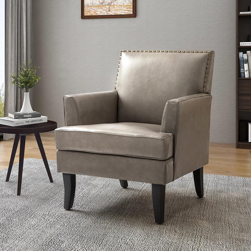 Fauteuil en cuir synthétique avec dossier clouté, rembourrage en mousse et pieds en bois massif noir | Marron / Bleu marine / Sauge / Gris | Siège unique
