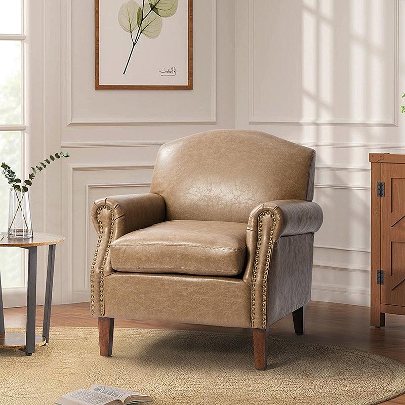 Fauteuil en cuir PU de couleur camel avec garniture cloutée, accoudoirs arrondis, rembourrage en mousse et pieds en bois de noyer massif | Marron / Camel / Taupe / Marine / Noir | Siège unique