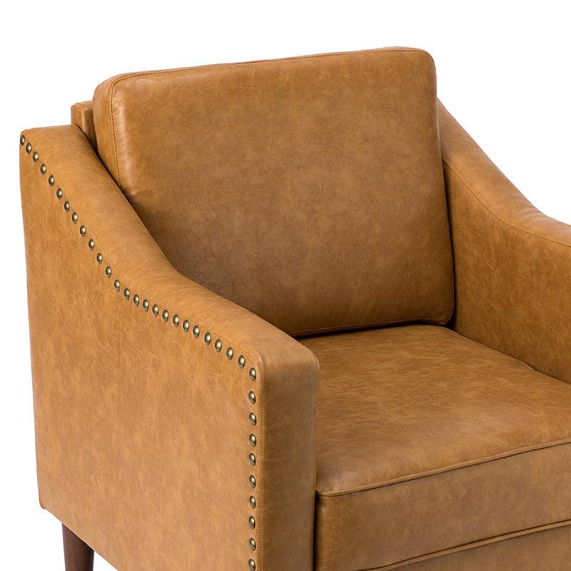 Fauteuil en cuir PU avec garniture cloutée, accoudoirs inclinés, coussins amovibles et pieds en bois massif | Camel / Noir / Beige / Marron / Marine | Siège unique