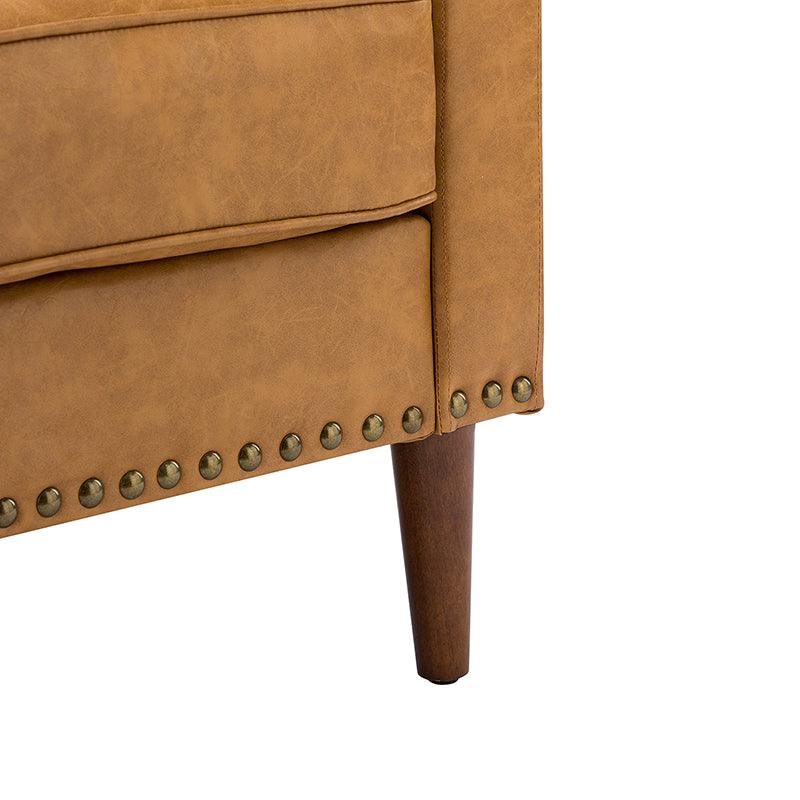 Fauteuil en cuir PU avec garniture cloutée, accoudoirs inclinés, coussins amovibles et pieds en bois massif | Camel / Noir / Beige / Marron / Marine | Siège unique