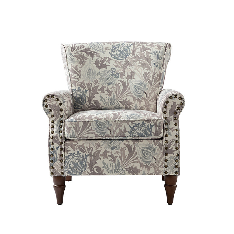 Fauteuil rembourré à accoudoirs roulés et garniture cloutée | Moutarde / Floral / Bleu / Peau de vache / Jaune / Vert / Noir / Gris / Marine / Pin / Médaillon / Rose | Siège unique