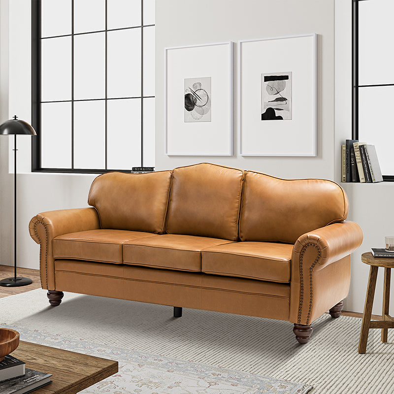 Canapé à accoudoirs arrondis en cuir véritable avec clous décoratifs, coussins amovibles, ressorts en S et pieds tournés en bois d'hévéa couleur noyer | Camel / Beige / Sauge / Noir / Bleu marine / Marron / Gris / Turquoise | 3 places