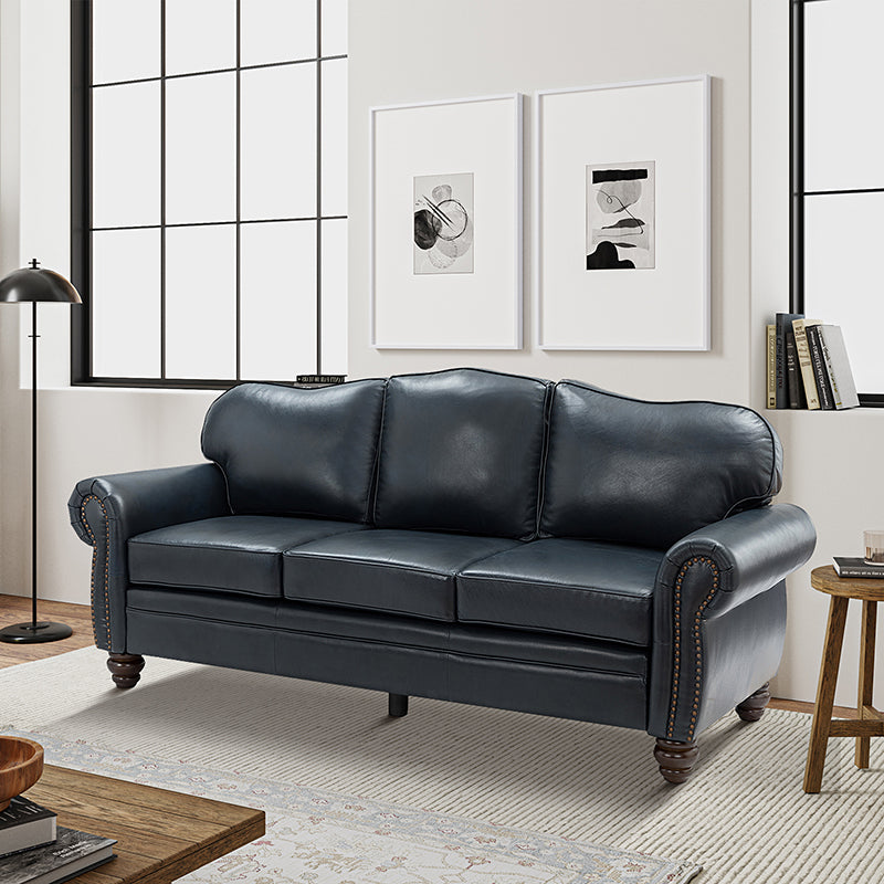 Canapé à accoudoirs arrondis en cuir véritable avec clous décoratifs, coussins amovibles, ressorts en S et pieds tournés en bois d'hévéa couleur noyer | Camel / Beige / Sauge / Noir / Bleu marine / Marron / Gris / Turquoise | 3 places