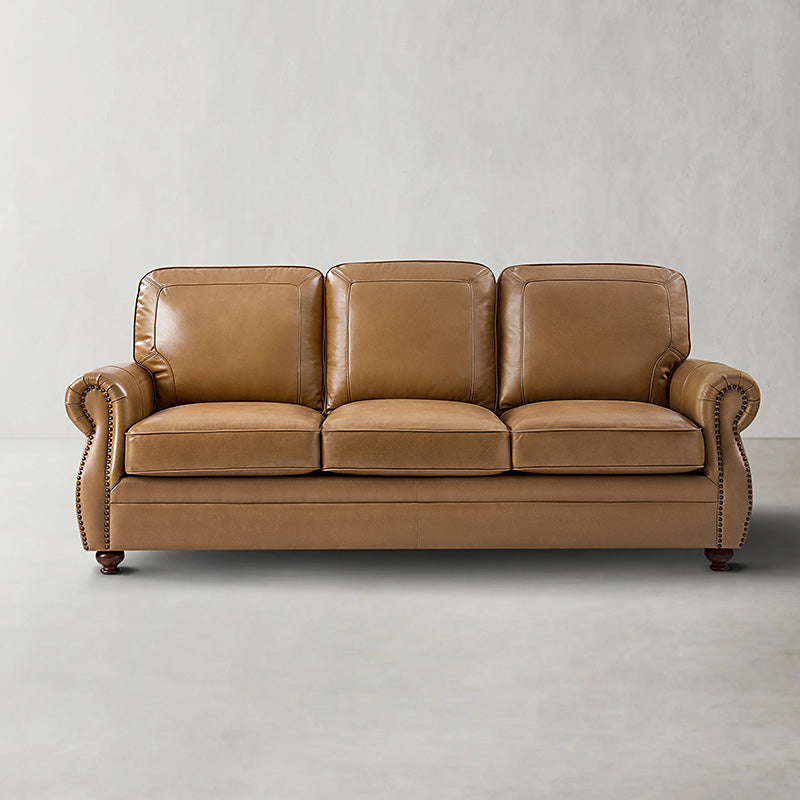 Canapé 3 places en cuir véritable avec accoudoirs roulés, clous décoratifs en cuivre, rembourrage en mousse et pieds en bois d'hévéa tournés | Couleur : Camel / Marine / Noir