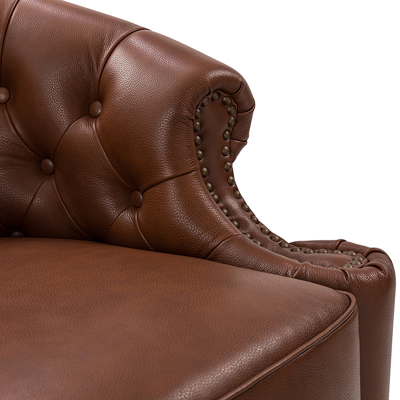 Fauteuil pivotant capitonné en cuir véritable avec accoudoirs roulés, garniture cloutée et pieds noirs | Chocolat / Caramel / Marron / Turquoise | Monoplace
